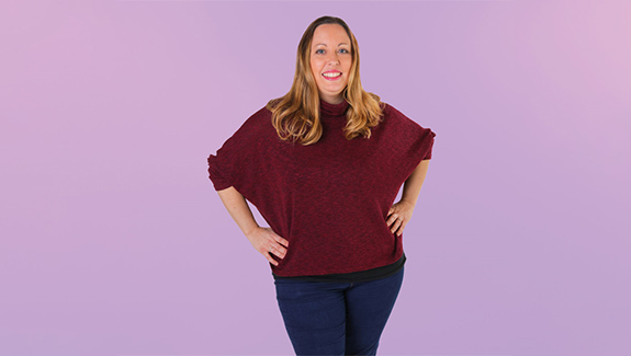 man-observing-stoma-pouch-on-his-abdomen-thinking-about-body-image-concerns-with-a-stoma