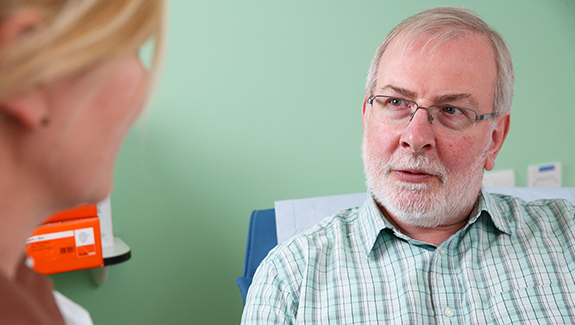 woman-walking-down-city-street-understanding-a-colostomy